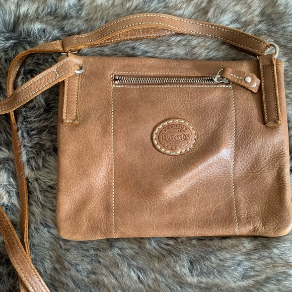Roots cross body purse